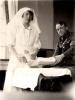 Photo #64
Nurse Redressing
Soldiers wounded leg